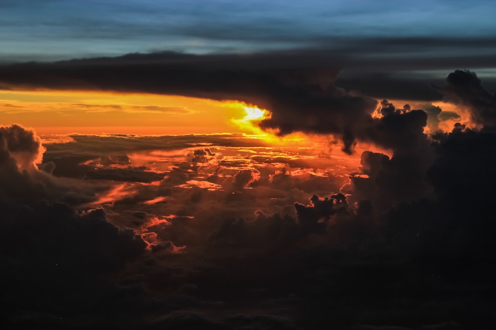 clouds and sun during sunset