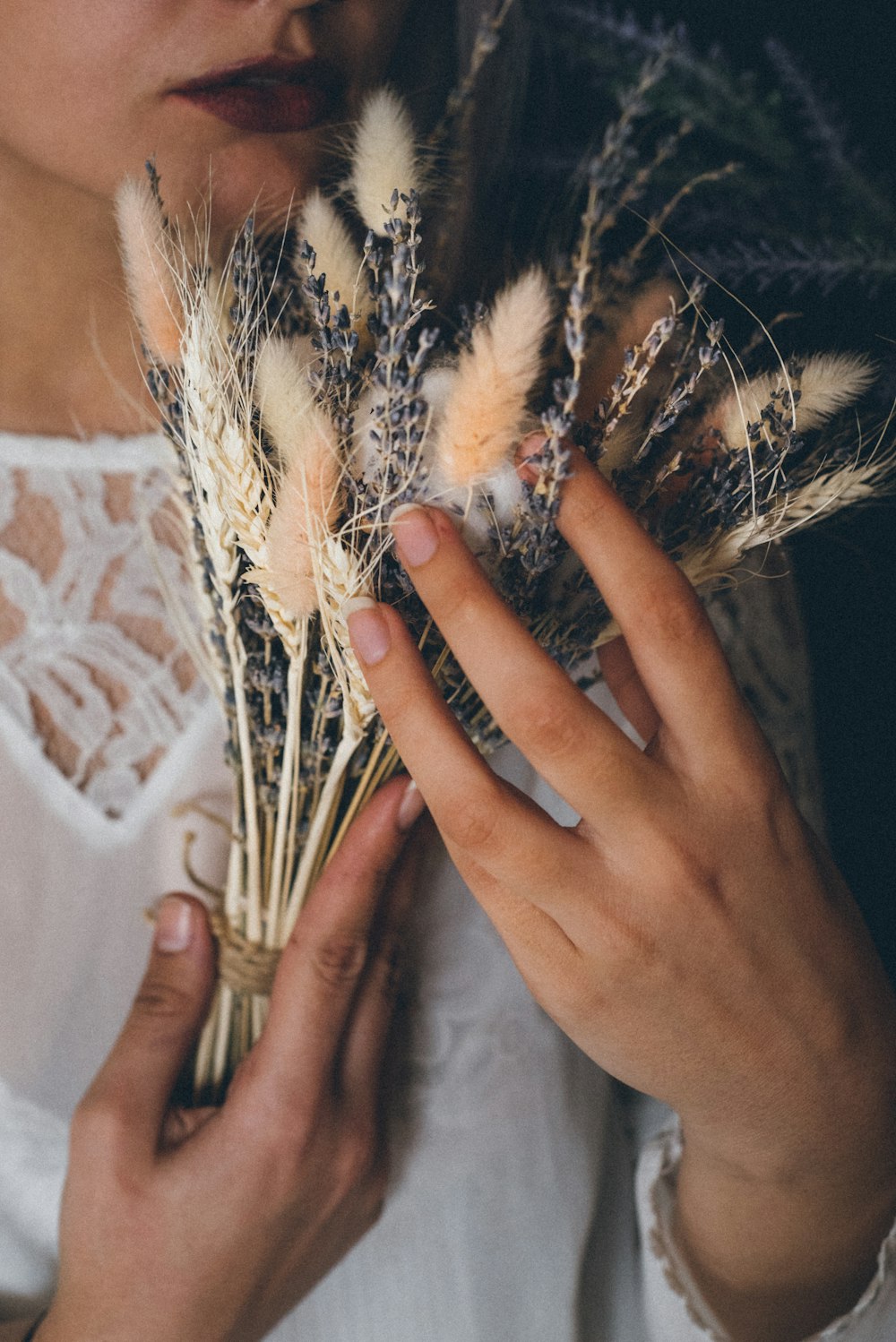 persons left hand on white and black textile