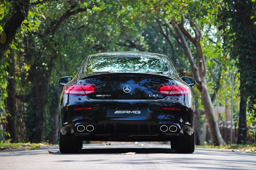 black bmw m 3 on road during daytime