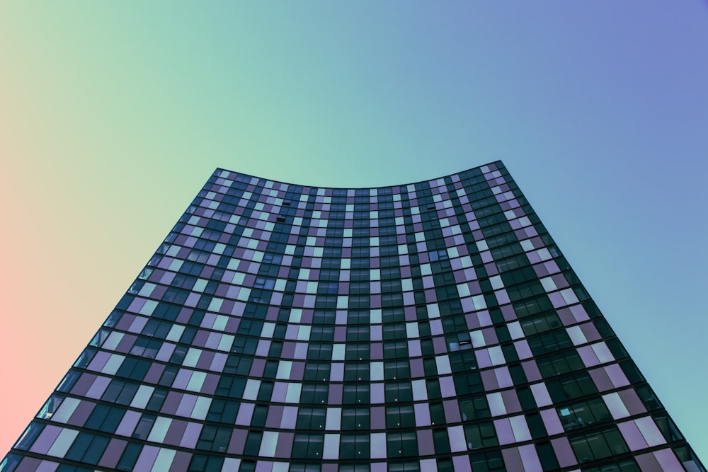 black and white building under blue sky