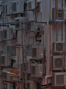 A pile of old window and split AC units ready for recycling in a Delhi warehouse.