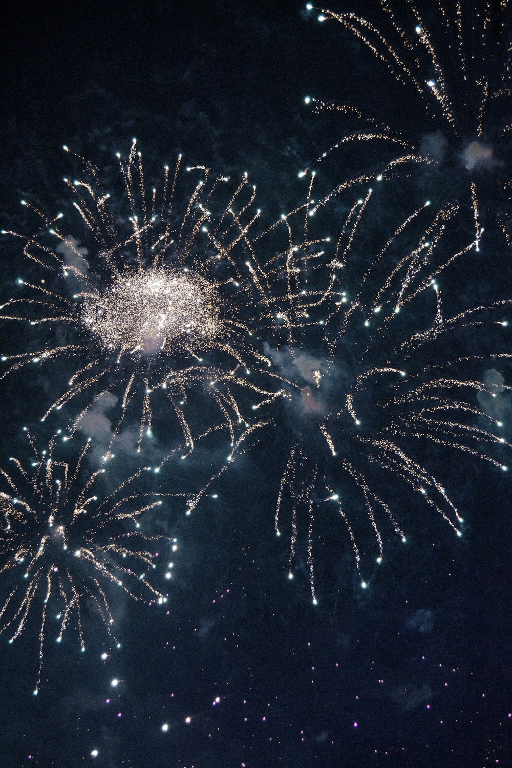 white and brown fireworks in the sky