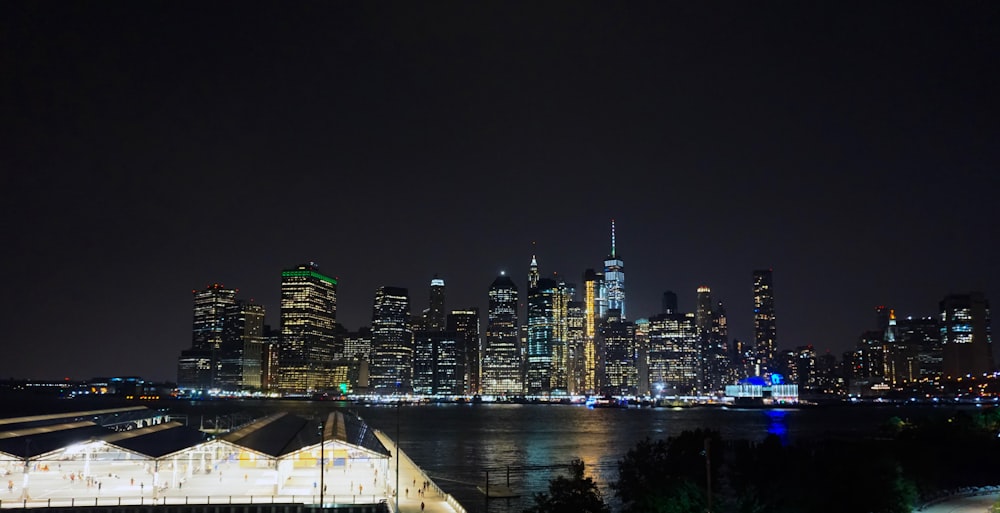 a view of a city at night from across the water