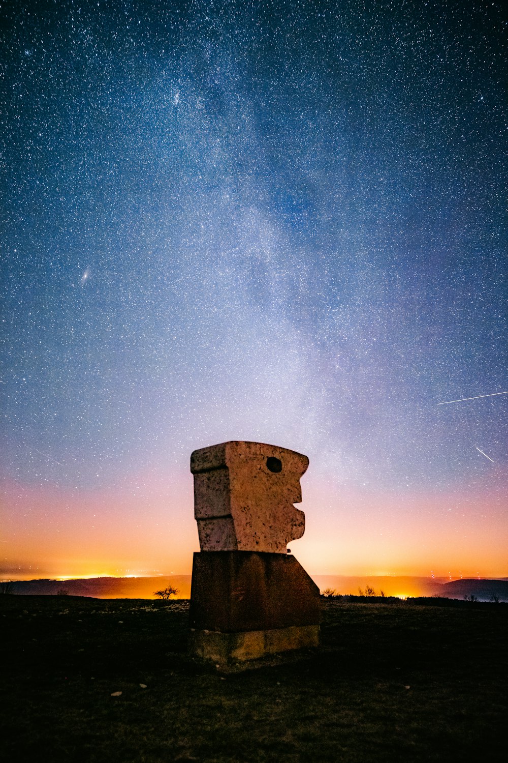 brown concrete building under starry night