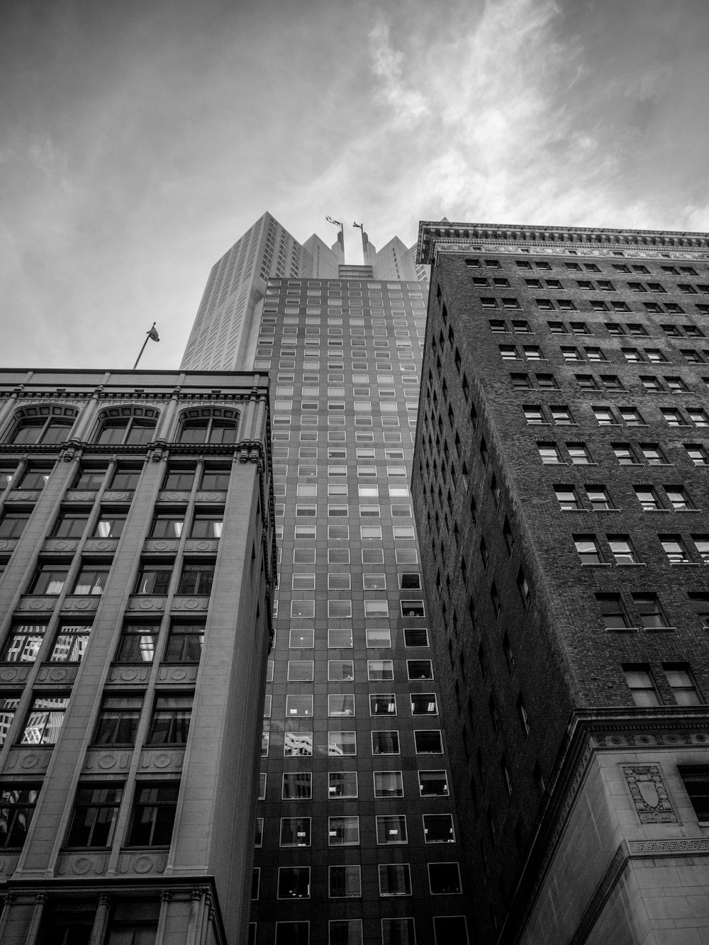 grayscale photo of high rise building