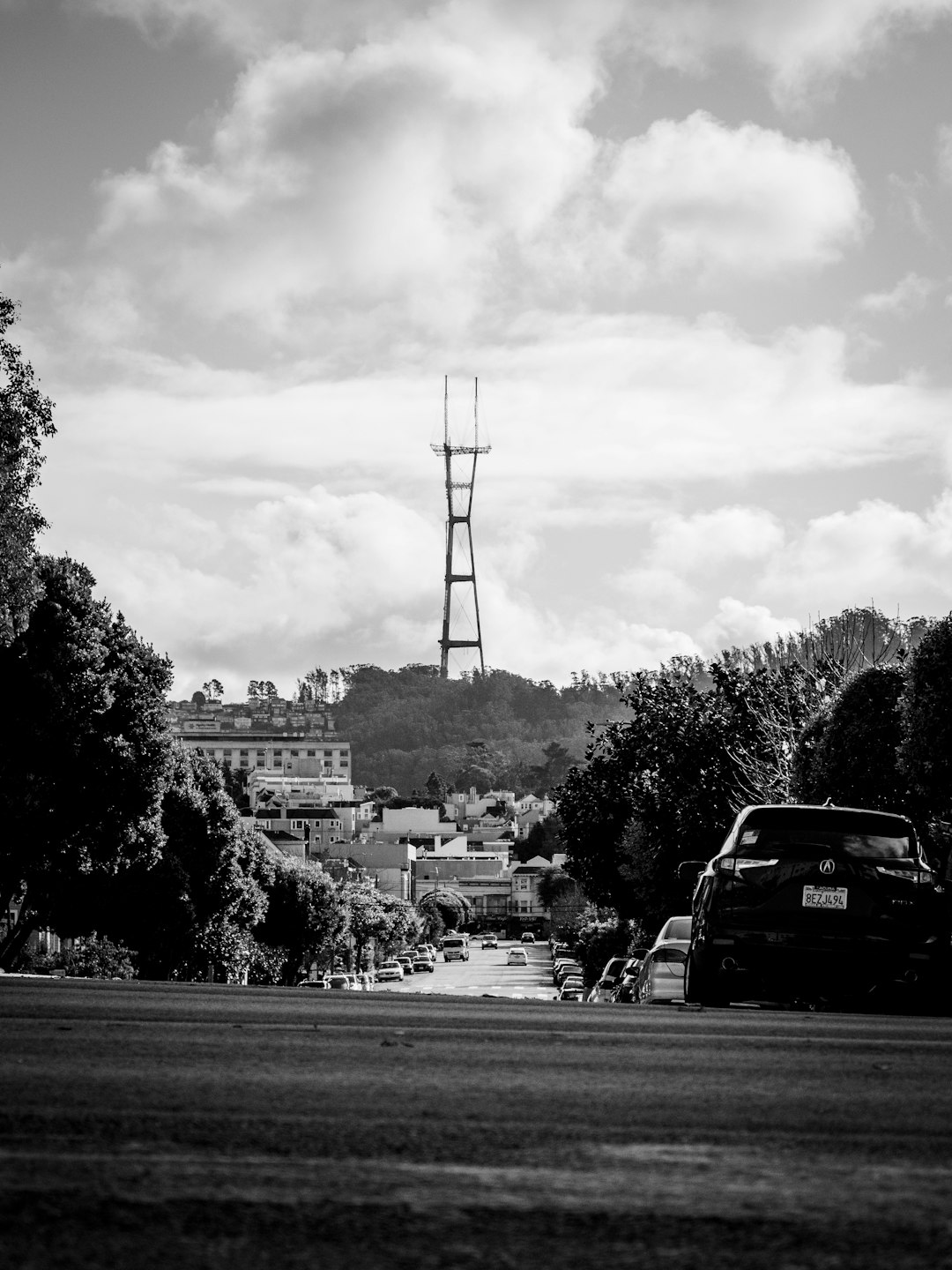 grayscale photo of cars on road