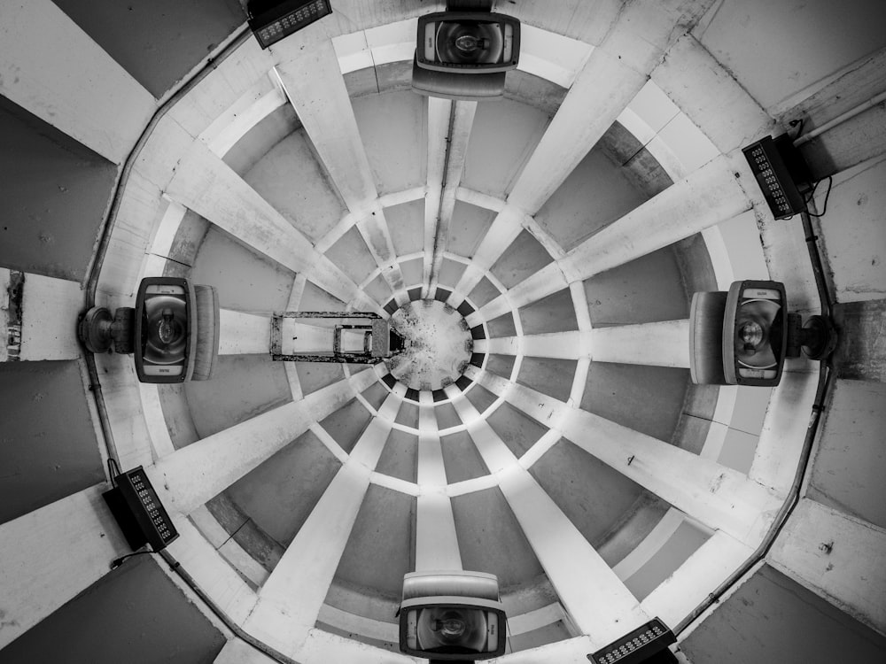 grayscale photo of round ceiling lamp