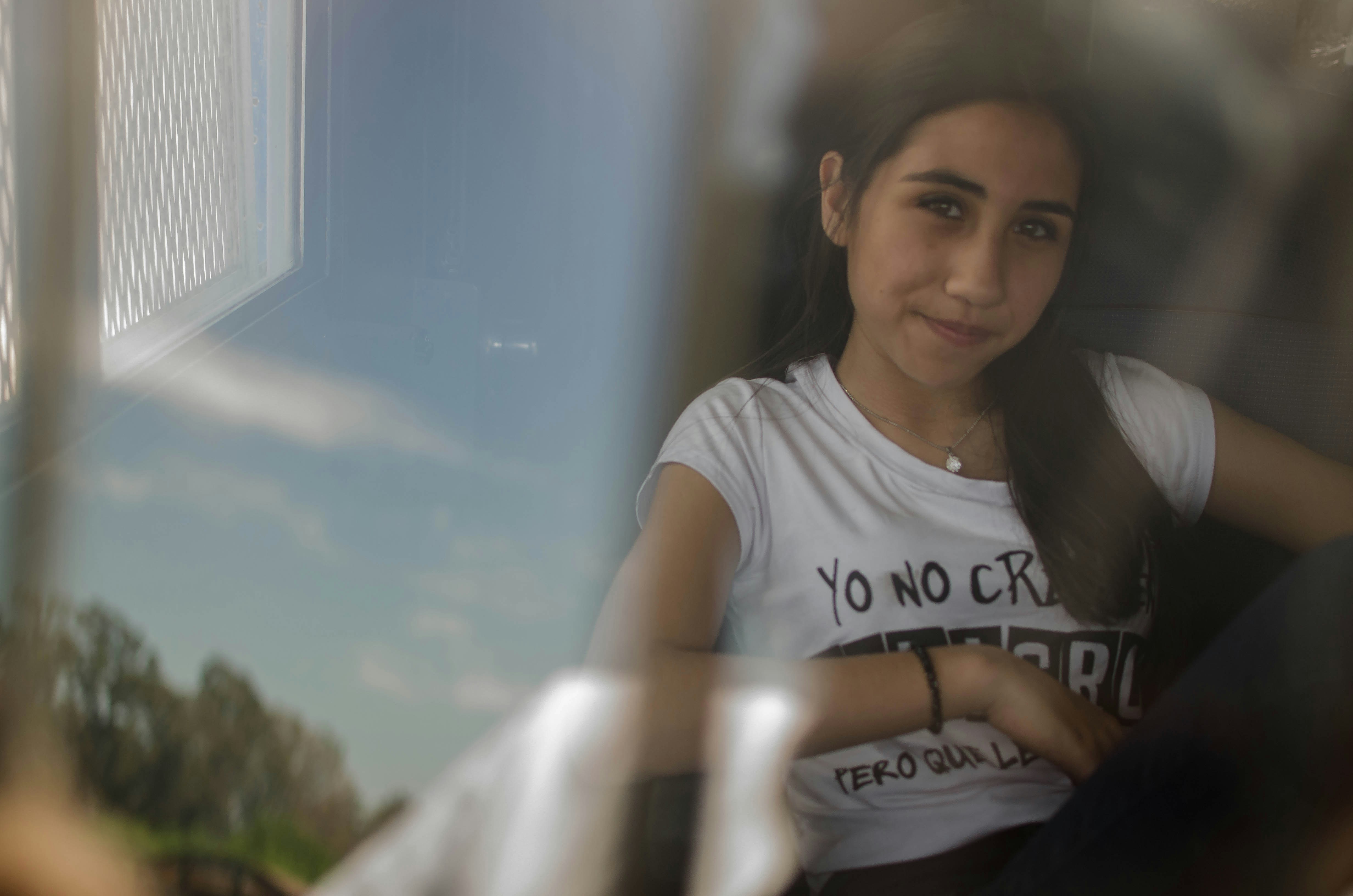 woman in white crew neck t-shirt