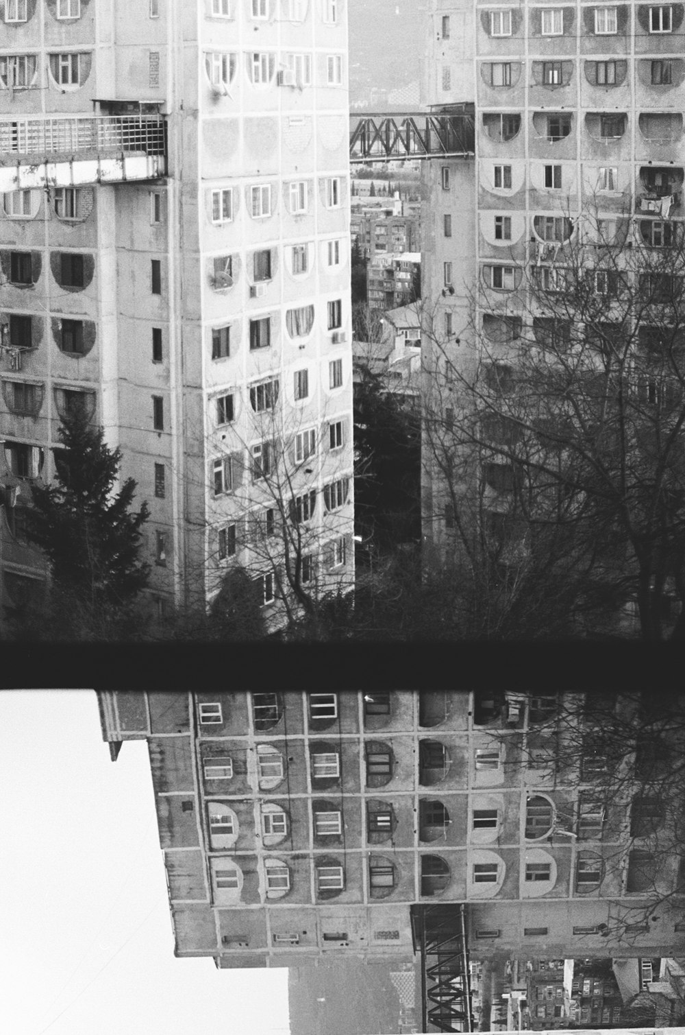 grayscale photo of high rise building