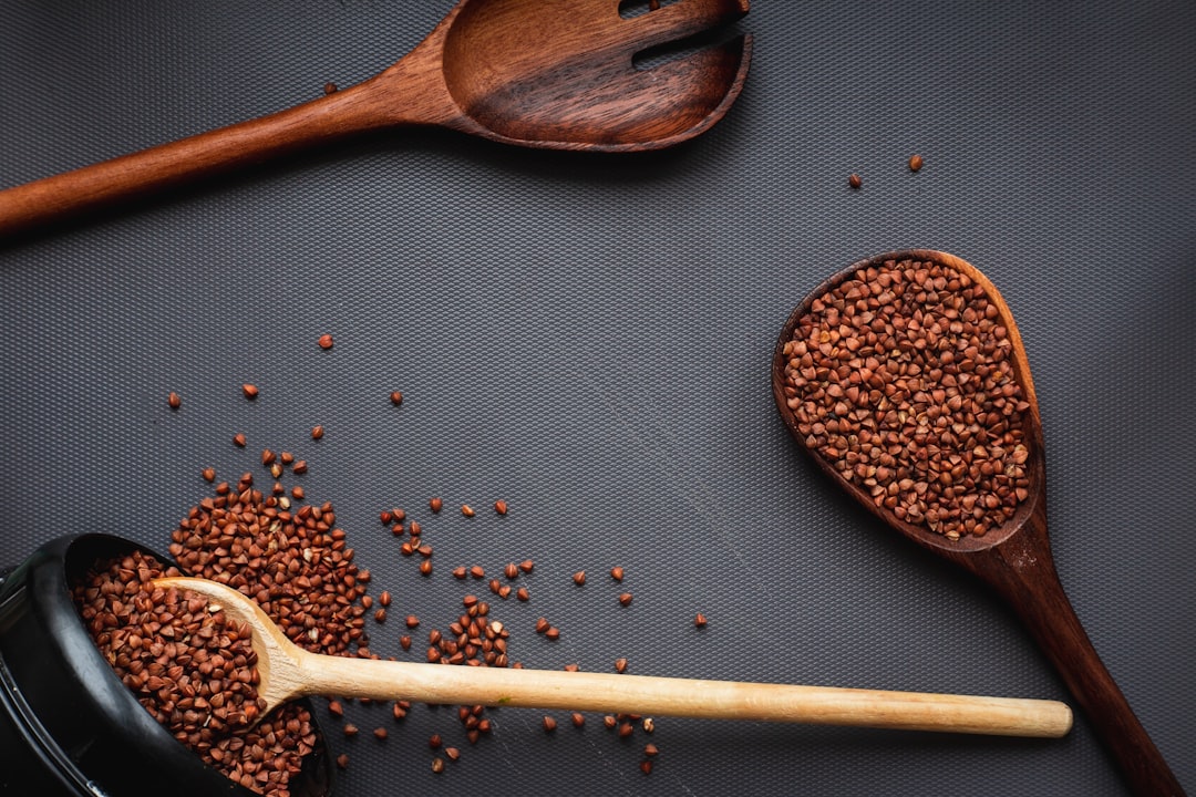 brown wooden spoon with brown powder