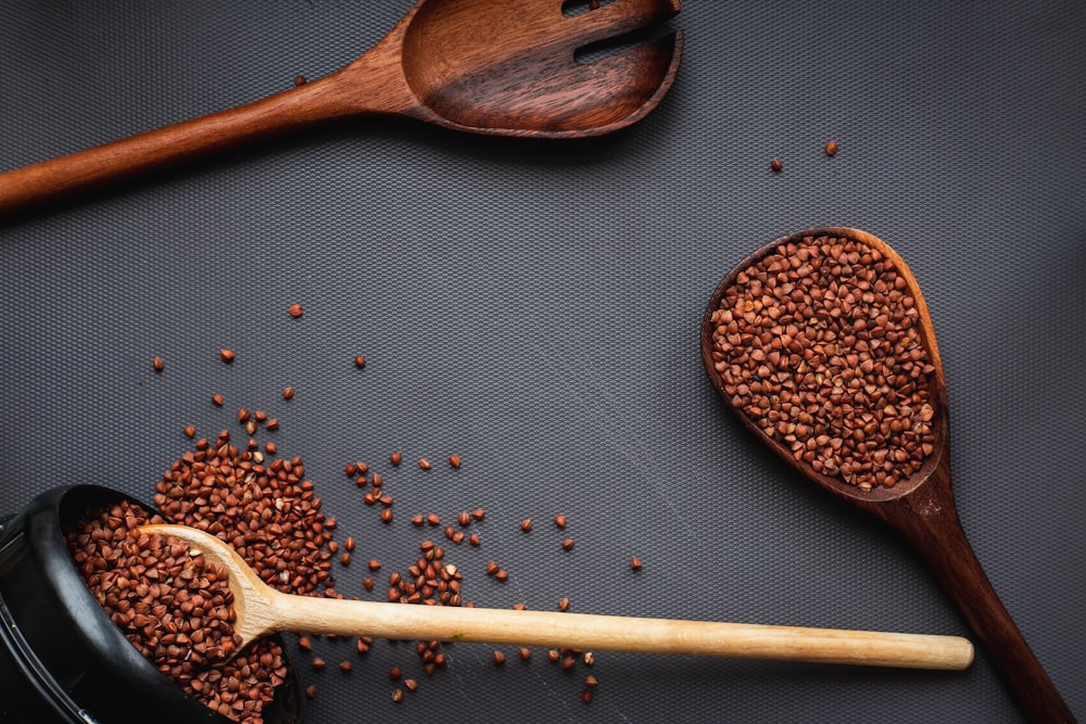 brown wooden spoon with brown powder