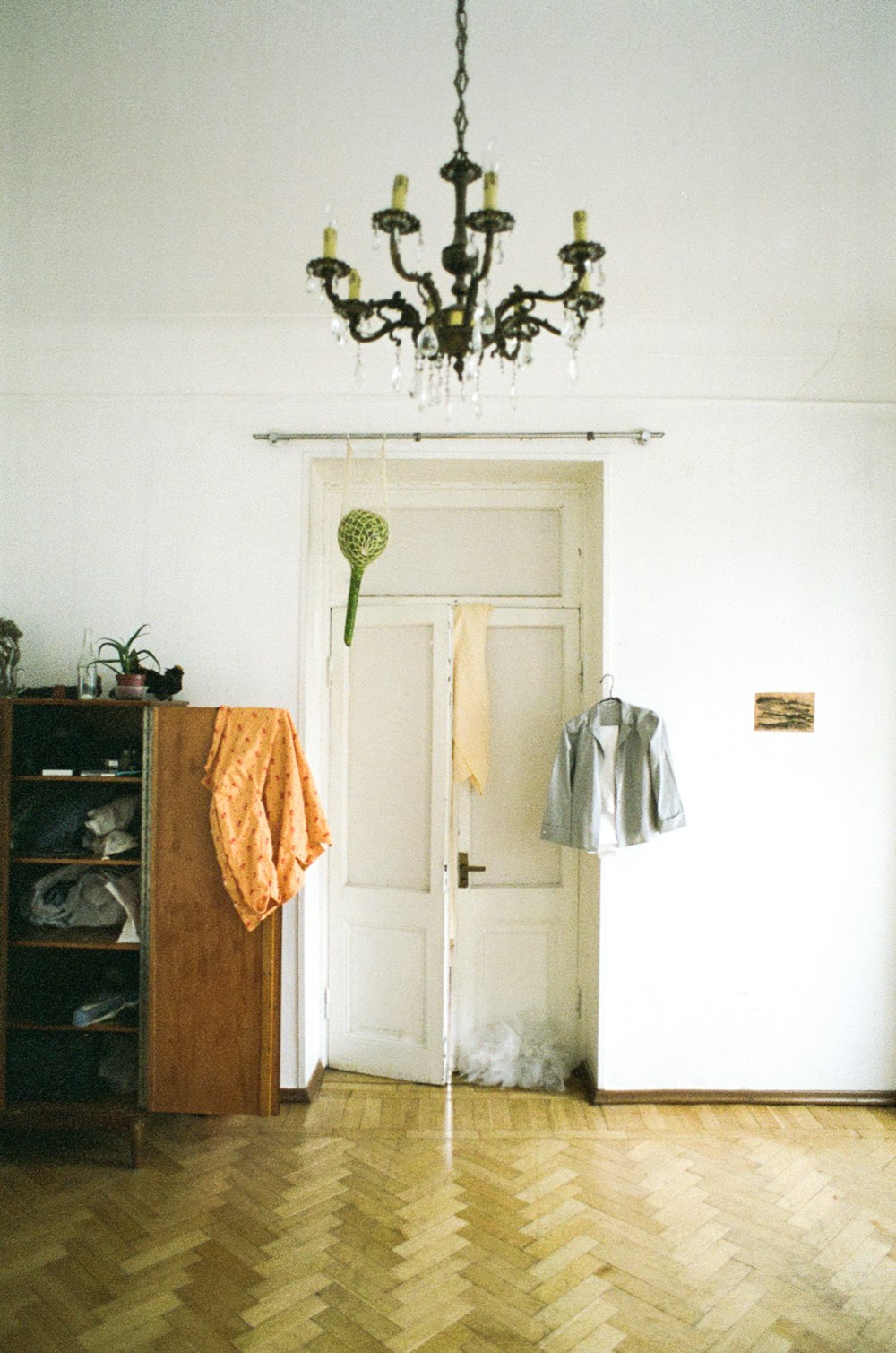 brown towel hanging on door