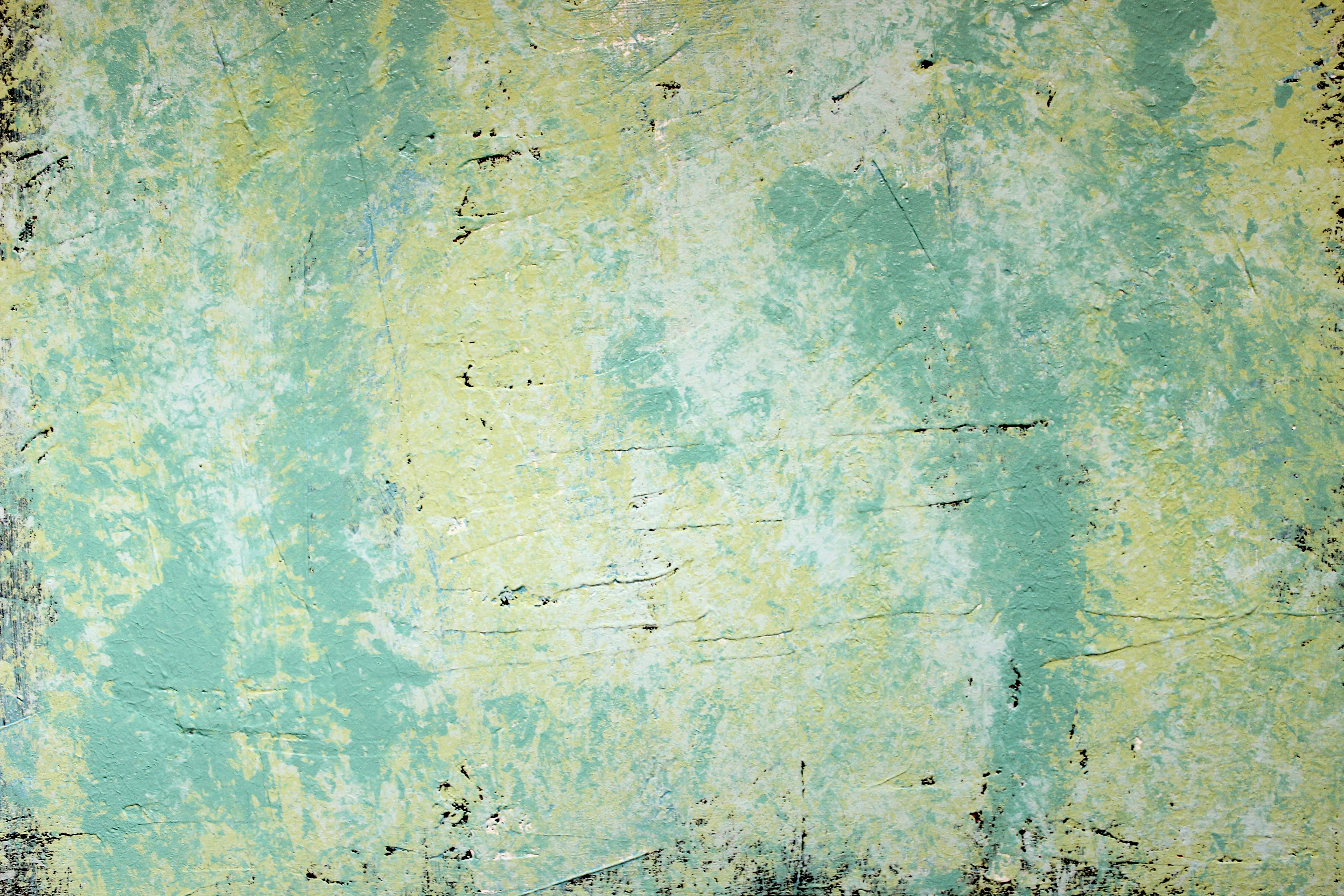 Abstract acrylic paint painting with cool colors and tones of aqua, blue, green, yellow, white, ivory with deep texture in the paint strokes. Nice background or wallpaper image of original artwork and mixed media techniques. Grunge style.