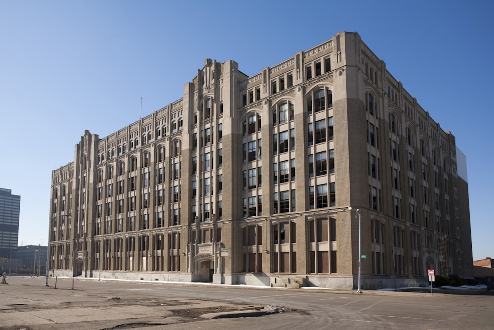 brown concrete building under blue sky during daytime