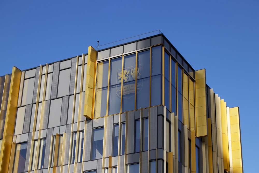 white concrete building under blue sky during daytime