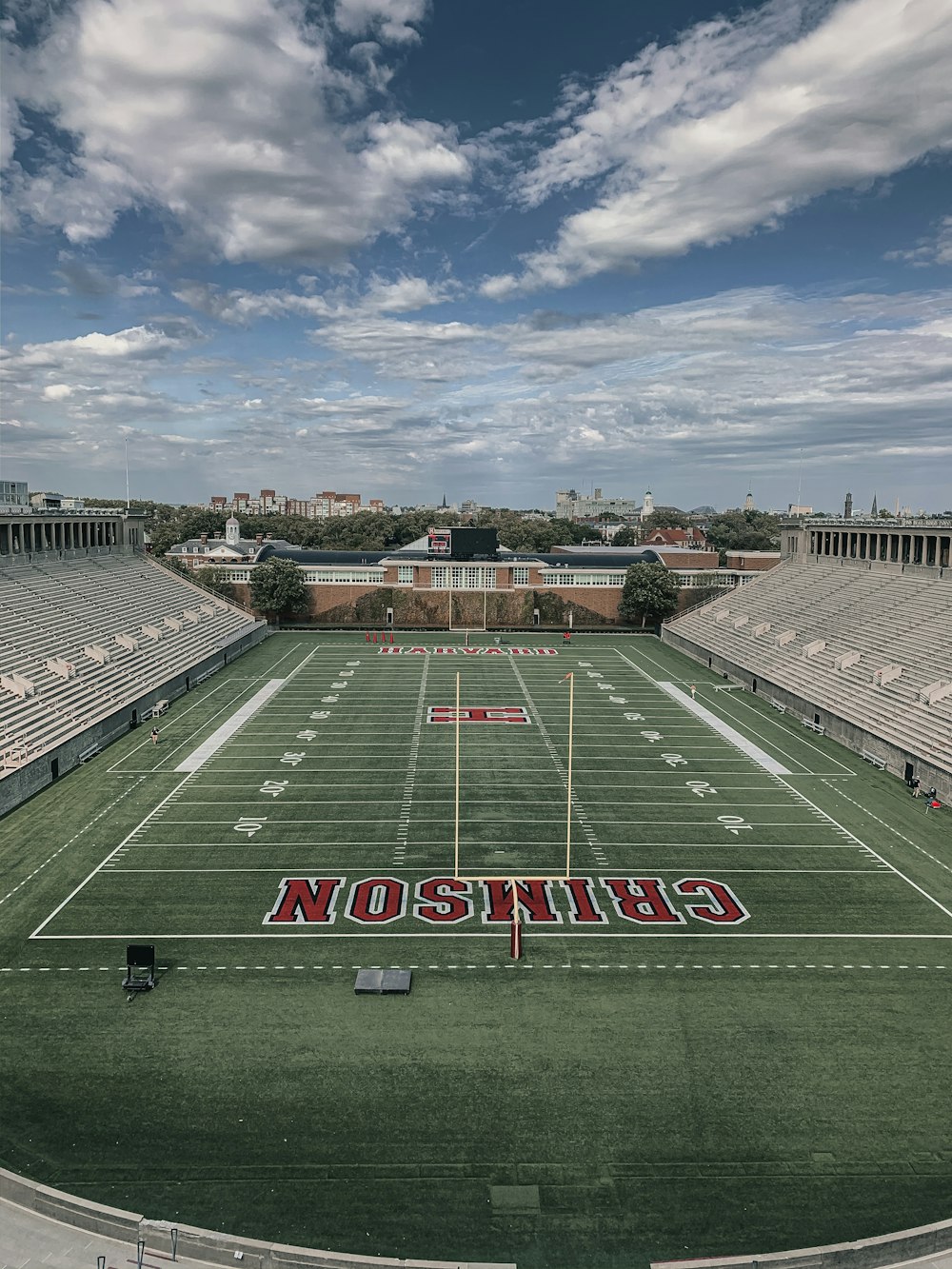 green and white UNK football field