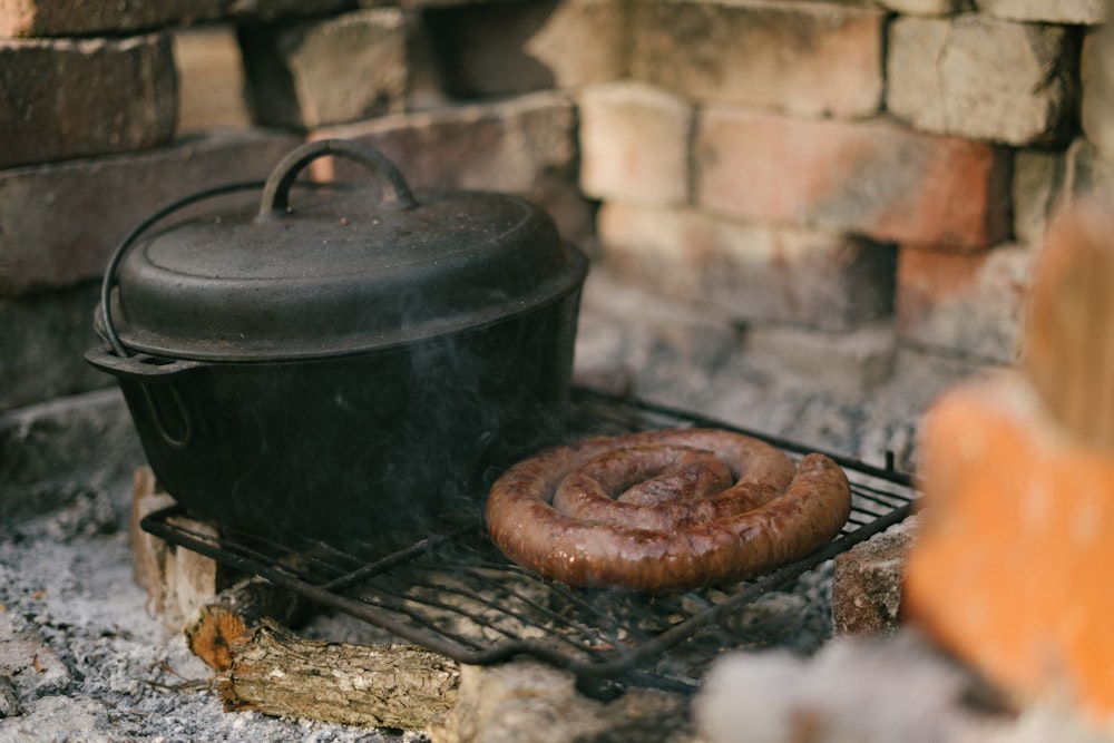 brown bread on black metal grill