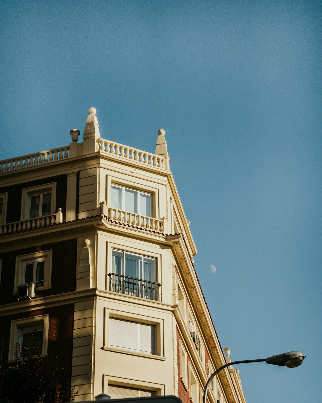 brown concrete building under blue sky during daytime