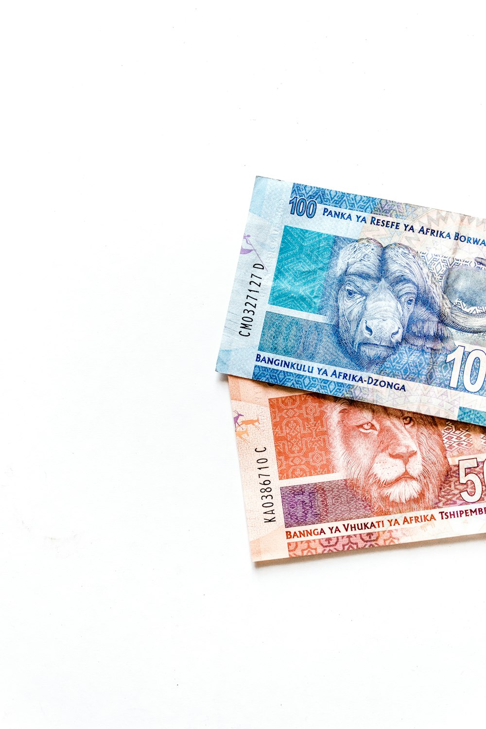 100 banknote on black textile