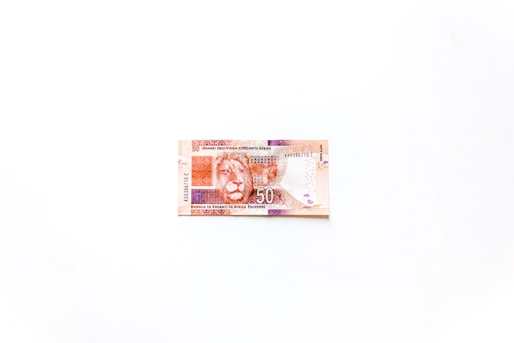 10 banknote on white surface
