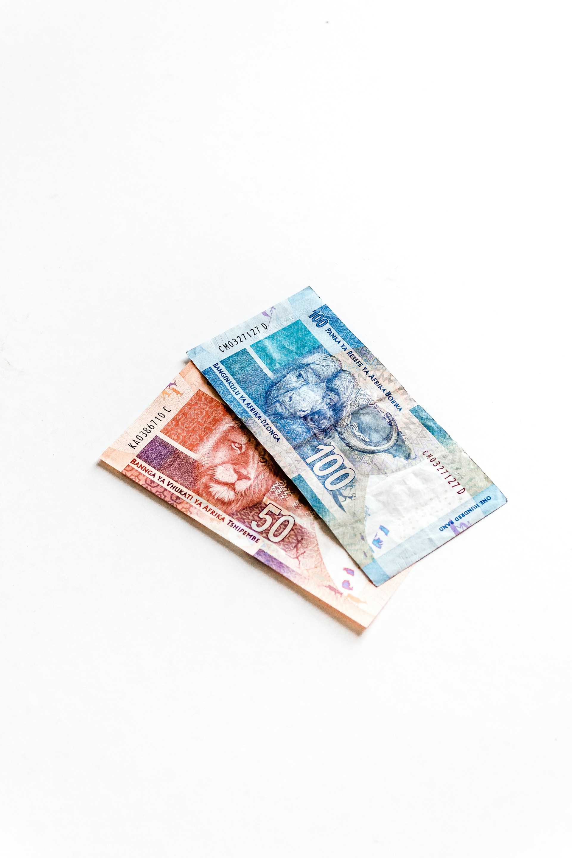 woman wearing yellow long-sleeved dress under white clouds and blue sky during daytime