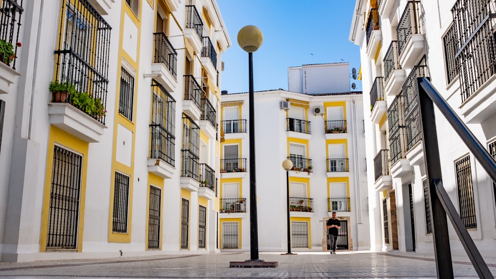 yellow and white concrete building during daytime