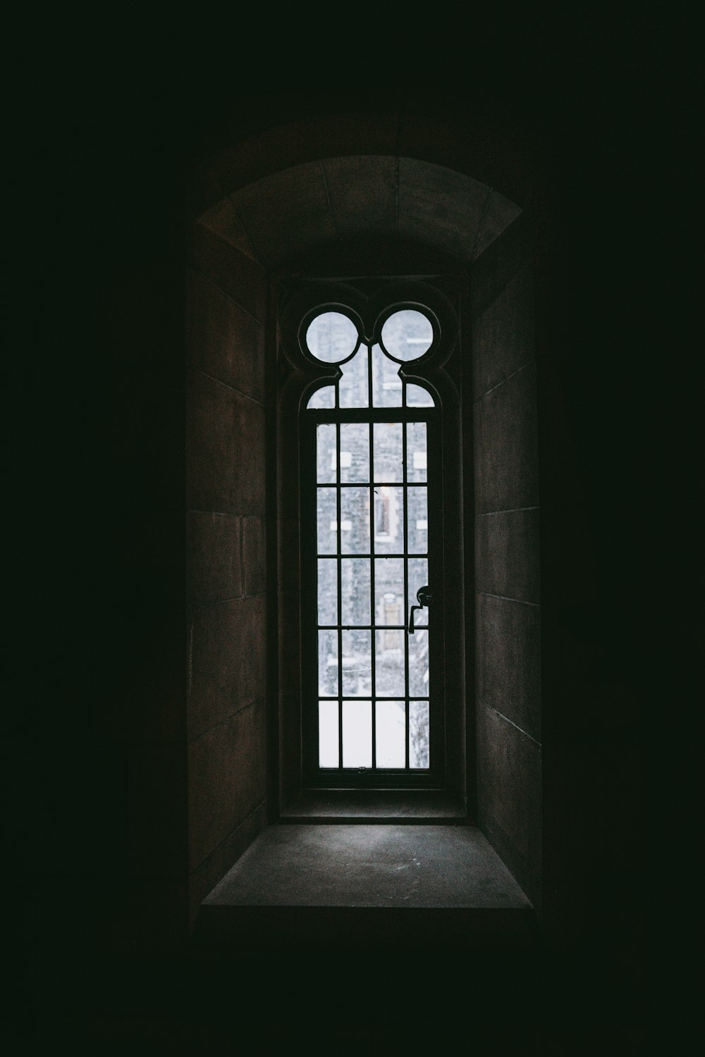 white wooden framed glass window