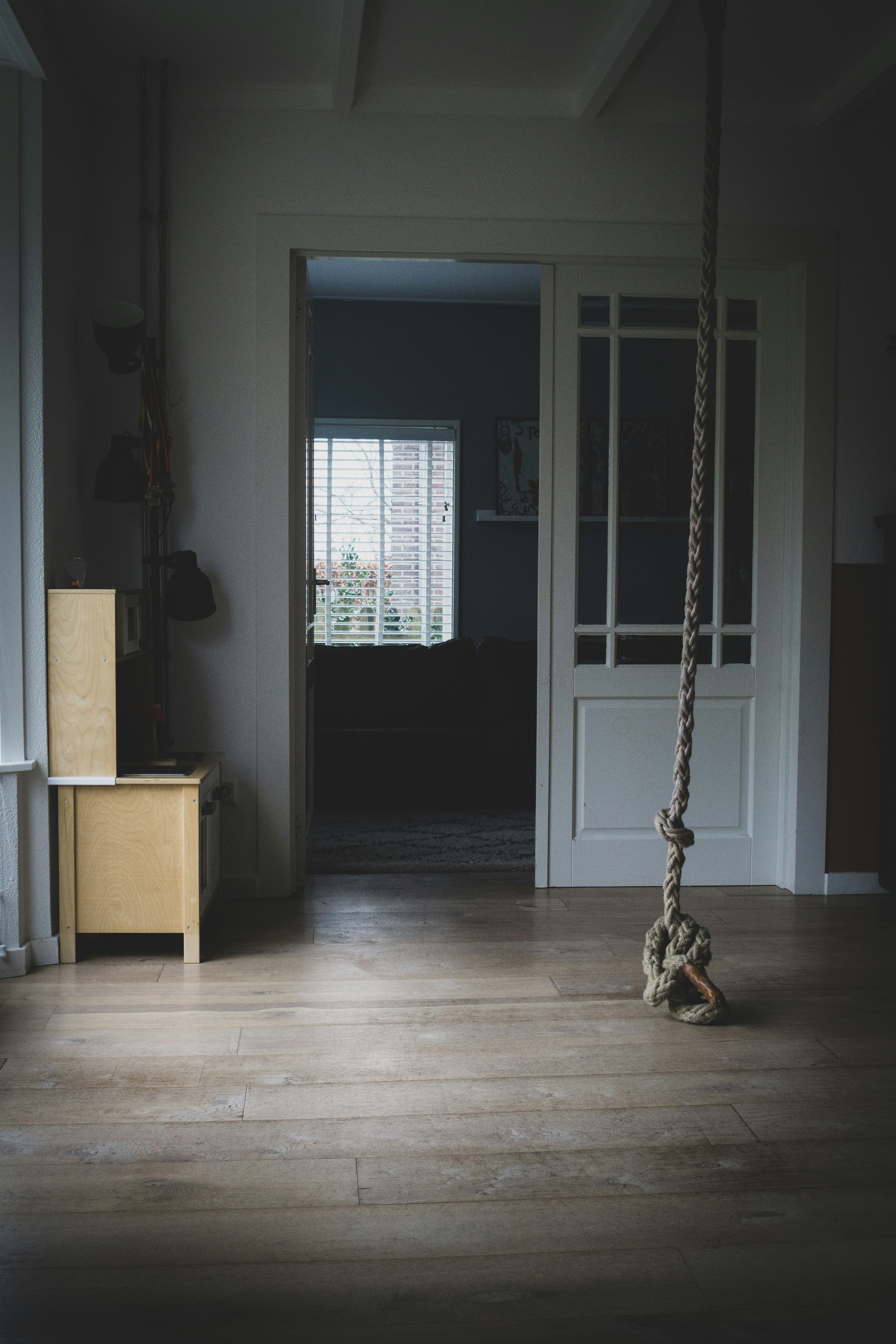 brown wooden chair near white wooden door