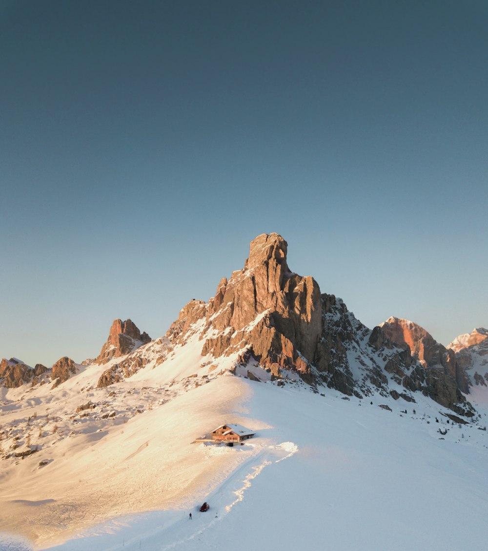 brown rocky mountain under blue sky during daytime