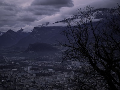 An atmospheric concept art piece featuring a shadowy urban landscape where The Living Spectre’s story unfolds.