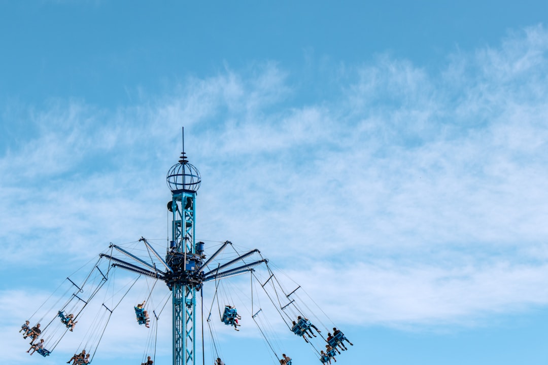 black and white wind mill under blue sky during daytime