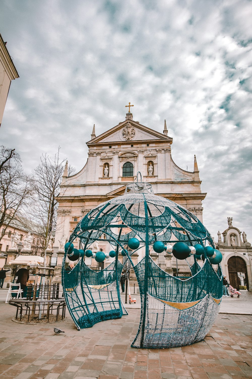 blue glass dome building under white clouds during daytime