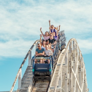 people on blue and white ship during daytime