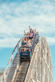 people on blue and white ship during daytime