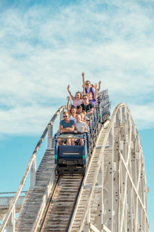 people on blue and white ship during daytime