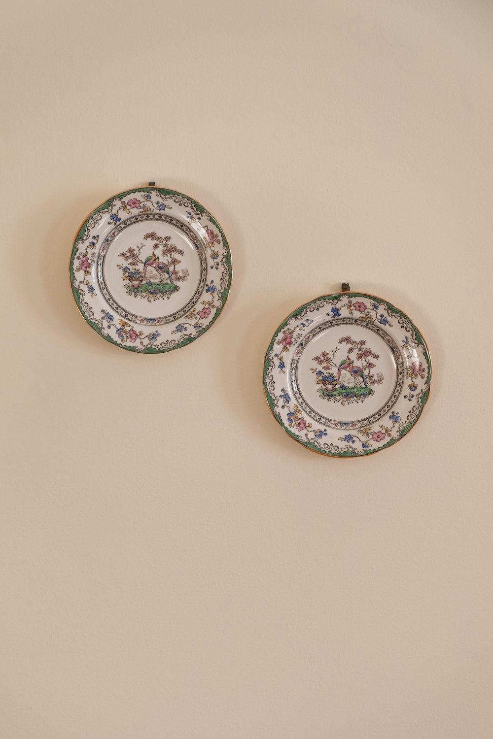 white blue and red floral ceramic plate