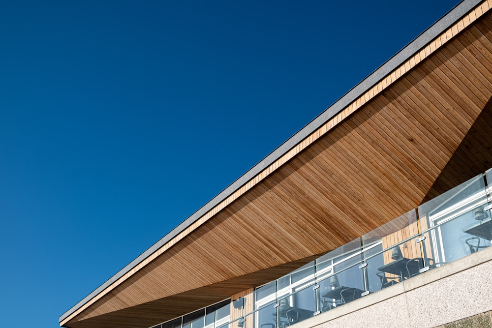 brown and white concrete building under blue sky during daytime