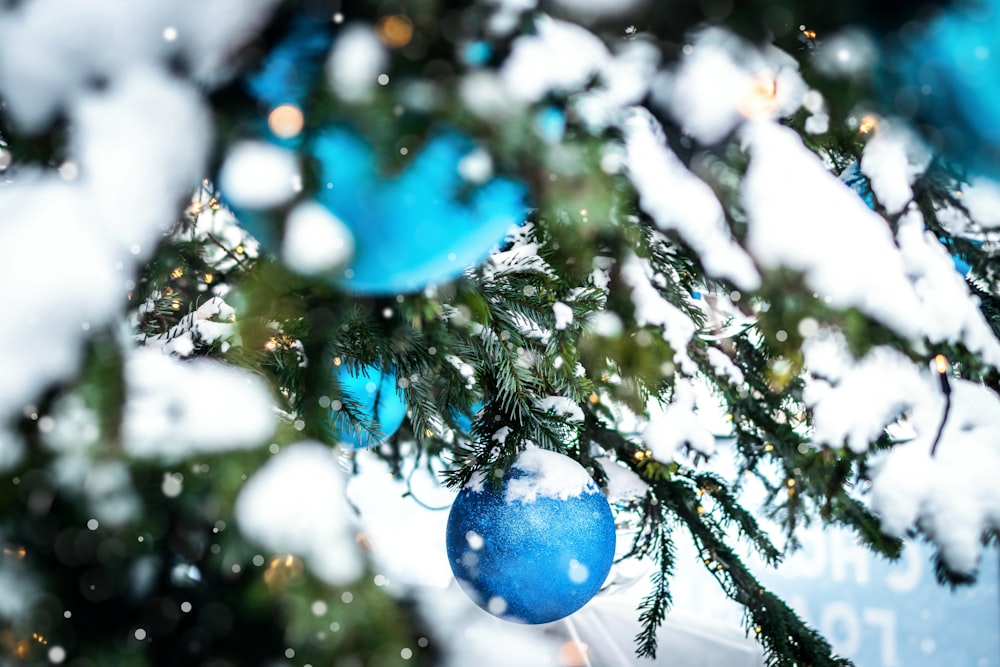 blue baubles on green christmas tree