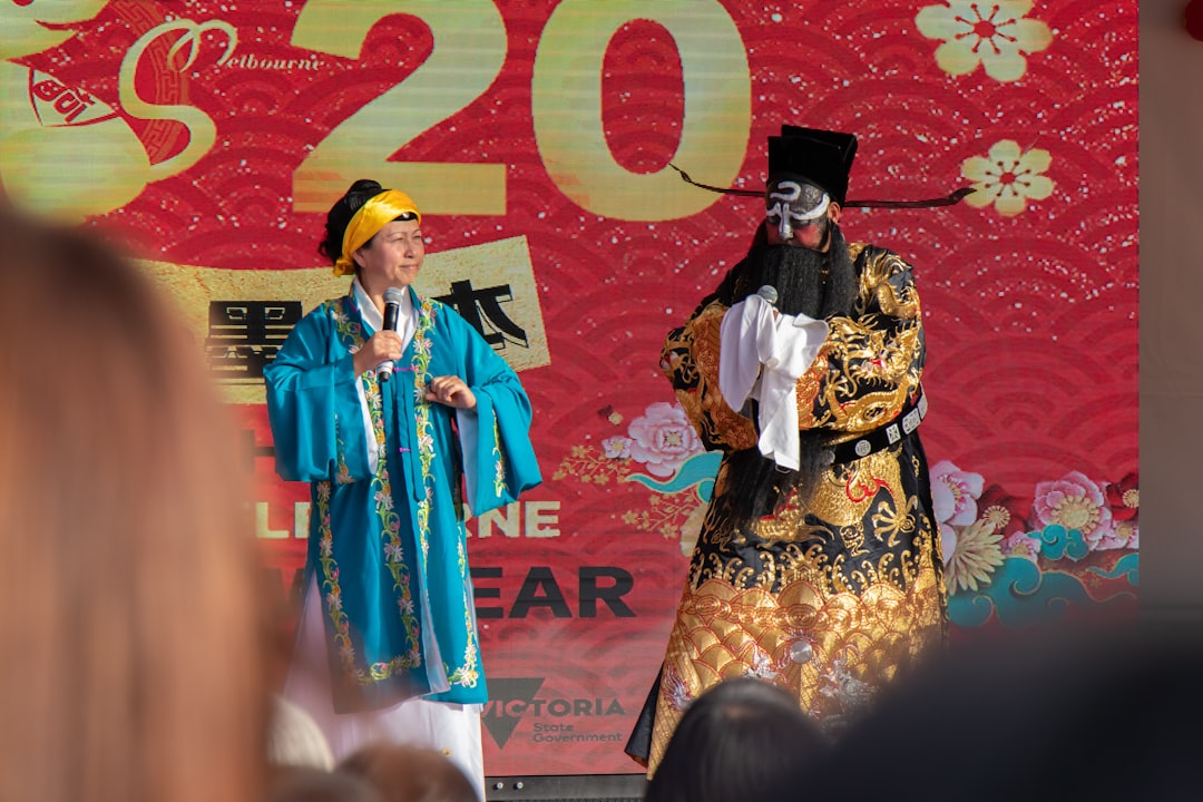 woman in blue and gold traditional dress