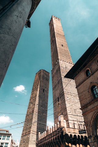 brown concrete building under blue sky during daytime