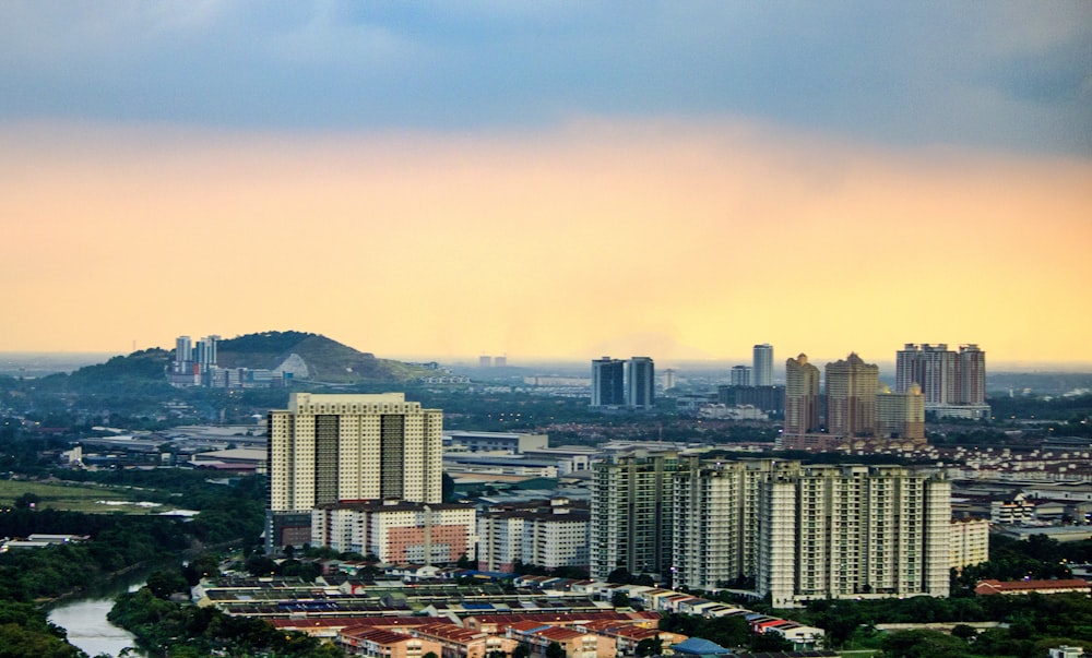 city skyline under white sky during daytime