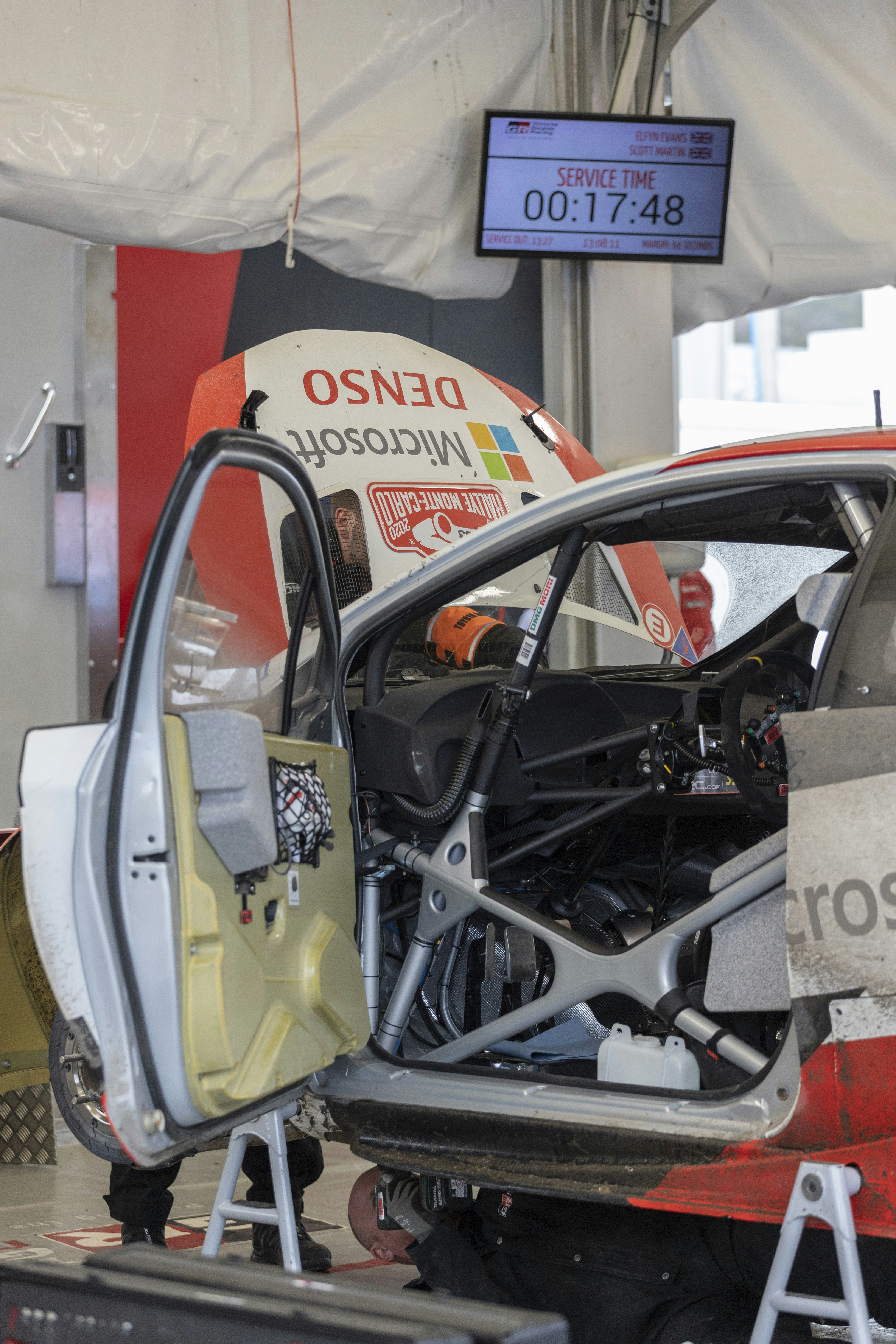 yellow and black car in garage