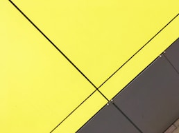 yellow and black wooden board