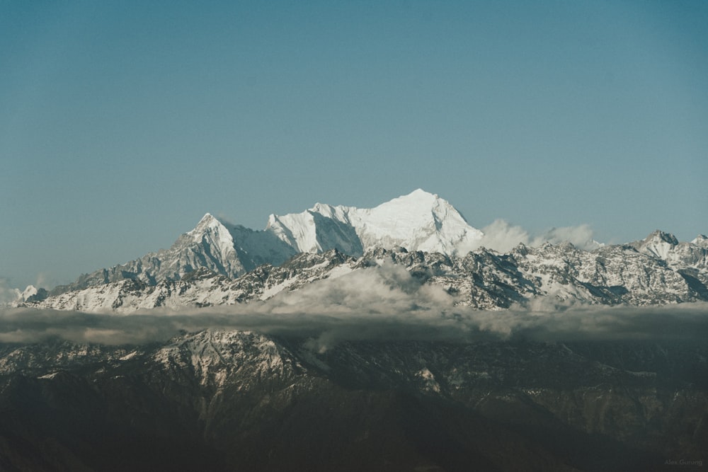 snow covered mountain under blue sky during daytime