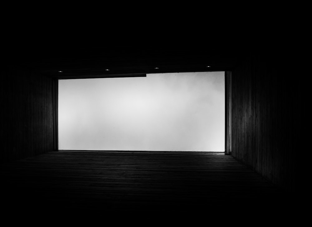 black wooden hallway with white fog
