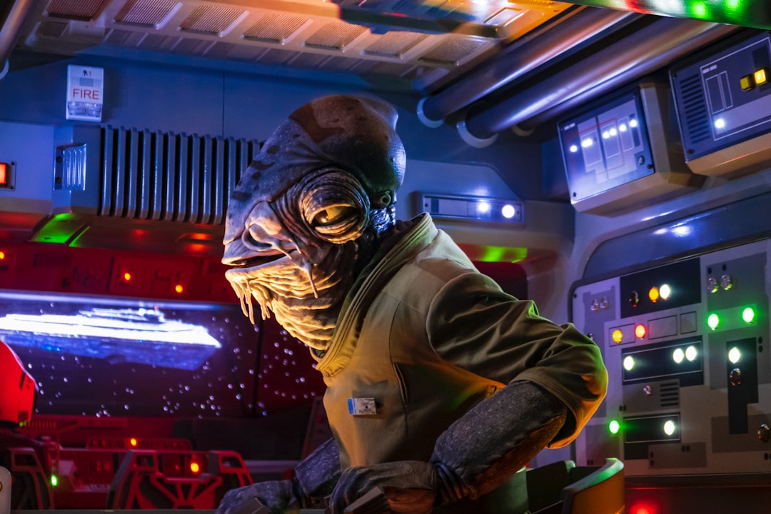 man in gray and black mask, Inside the Rise of the Resistance transport from a recent trip to Walt Disney World.