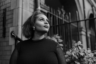 woman in black crew neck shirt in grayscale photography