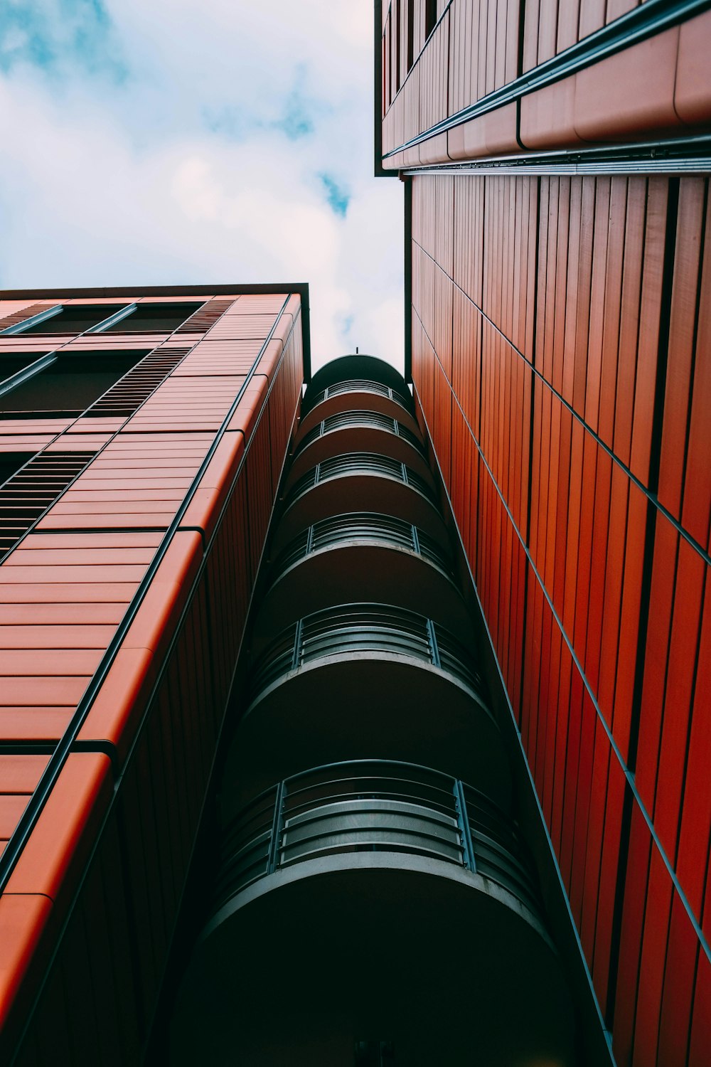 black and red building under blue sky