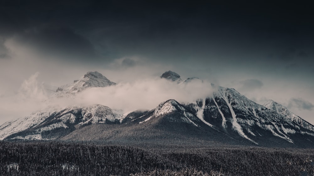 snow covered mountain during daytime