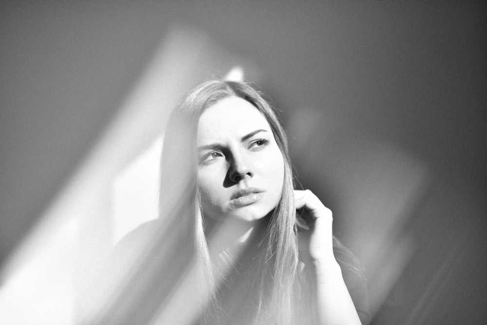 grayscale photo of woman with long hair